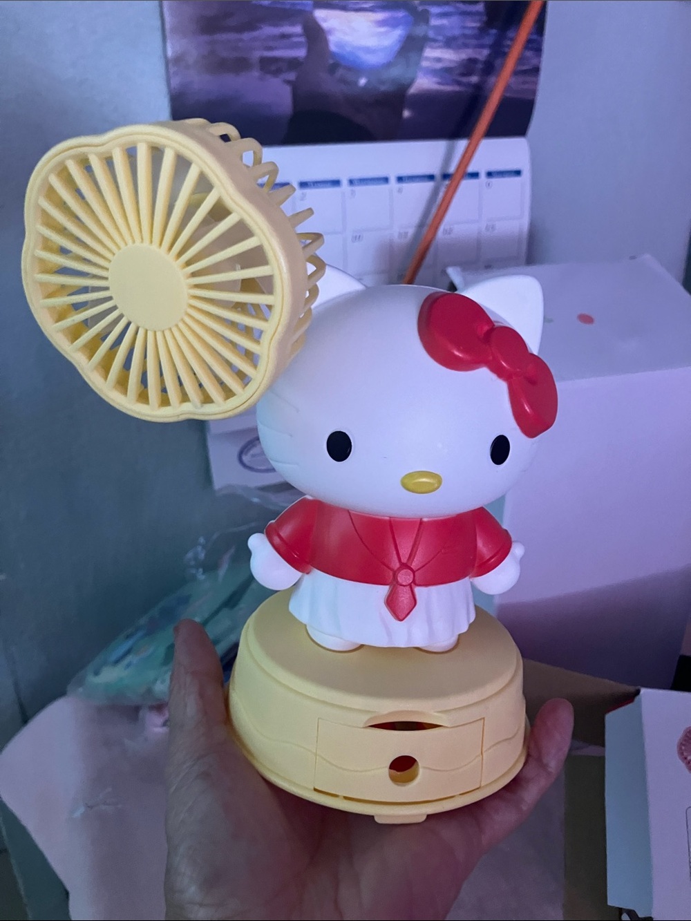 Hello Kitty Yellow Fan Figure with Red Bow